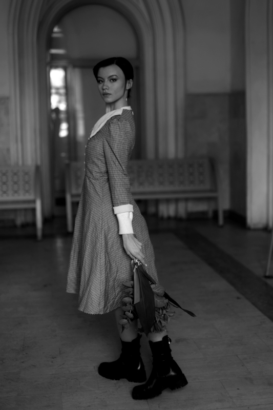1317 :: Girl with flowers at train station